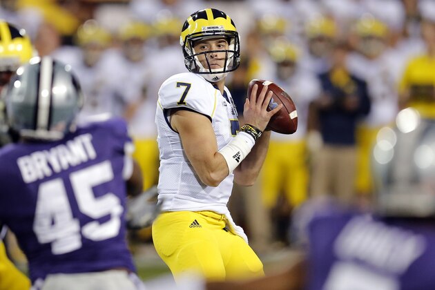 Michigan quarterback Shane Morris (7) looks to pass against Kansas State during the first half of the Buffalo Wild Wings Bowl NCAA college football game, Saturday, Dec. 28, 2013, in Tempe, Ariz. (AP Photo/Matt York)