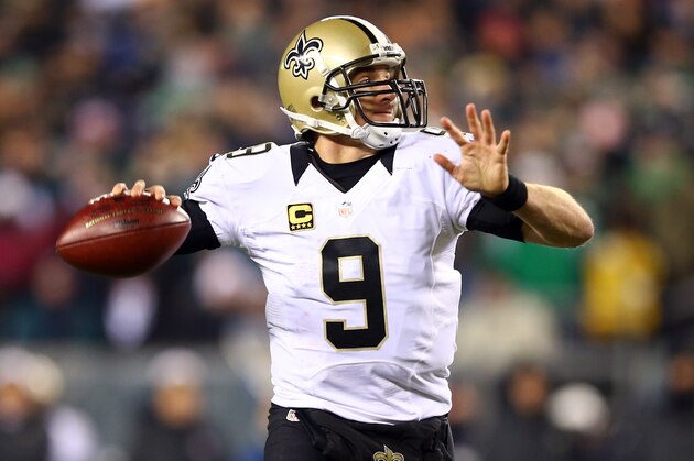 PHILADELPHIA, PA - JANUARY 04:  Drew Brees #9 of the New Orleans Saints throws a pass against the Philadelphia Eagles during their NFC Wild Card Playoff game at Lincoln Financial Field on January 4, 2014 in Philadelphia, Pennsylvania.  (Photo by Elsa/Getty Images)