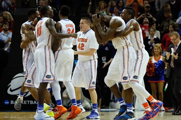 MEMPHIS, TN - MARCH 29: The Florida Gators celebrate on the court after defeating the Dayton Flyers 62-52 in the south regional final of the 2014 NCAA Men's Basketball Tournament at the FedExForum on March 29, 2014 in Memphis, Tennessee. (Photo by Kevin C. Cox/Getty Images) MEMPHIS, TN - MARCH 29: The Florida Gators celebrate on the court after defeating the Dayton Flyers 62-52 in the south regional final of the 2014 NCAA Men's Basketball Tournament at the FedExForum on March 29, 2014 in Memphis, Tennessee. (Photo by Kevin C. Cox/Getty Images)