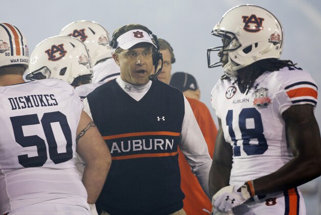 Auburn head coach Gus Malzahn during the first half of the NCAA BCS National Championship college football game against Florida State Monday, Jan. 6, 2014, in Pasadena, Calif. (AP Photo/David J. Phillip) Auburn head coach Gus Malzahn during the first half of the NCAA BCS National Championship college football game against Florida State Monday, Jan. 6, 2014, in Pasadena, Calif. (AP Photo/David J. Phillip)