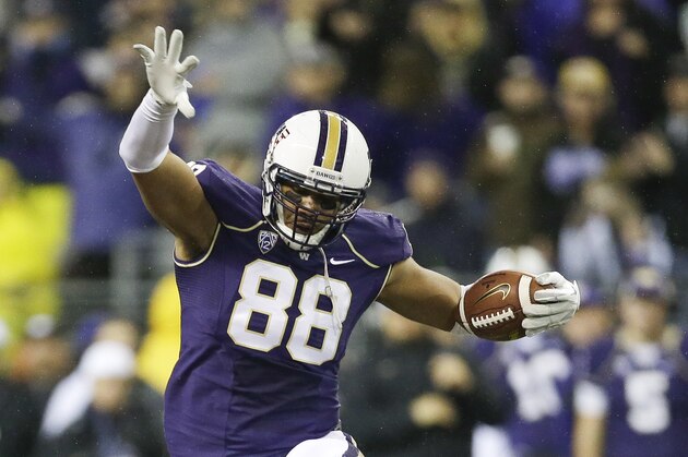 Washington tight end Austin Seferian-Jenkins (88) carries the ball after a reception against Colorado in the first half of an NCAA college football game, Saturday, Nov. 9, 2013, in Seattle. (AP Photo/Ted S. Warren)