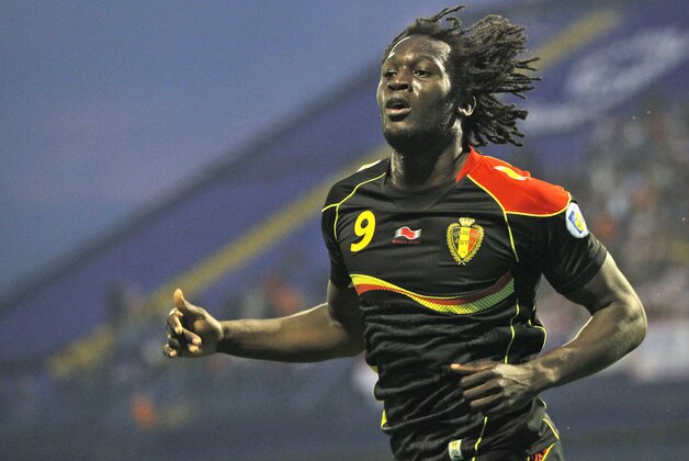 Belgium's Romelu Lukaku celebrates scoring the opening goal against Croatia during their group A World Cup qualifying soccer match in Zagreb, Friday, Oct. 11, 2013. (AP Photo/Darko Bandic)