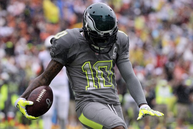 Philadelphia Eagles DeSean Jackson (10) of Team Sanders celebrates after making a catch for a touchdown in the first half during the Pro Bowl, Sunday, Jan. 26, 2014, at Aloha Stadium in Honolulu. (AP Photo/Eugene Tanner)
