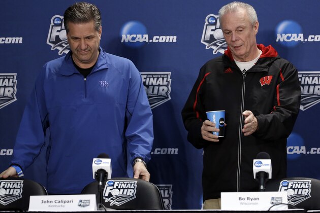 Wisconsin head coach Bo Ryan, right, and Kentucky head coach John Calipari arrive for a joint news conference for their NCAA Final Four tournament college basketball semifinal game Thursday, April 3, 2014, in Dallas. Wisconsin plays Kentucky on Saturday, April 5, 2014. (AP Photo/David J. Phillip)