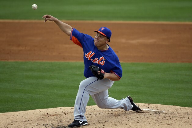 New York Mets starting pitcher Bartolo Colon throws in the second inning of an exhibition spring training baseball game against the Miami Marlins, Saturday, March 22, 2014, in Jupiter, Fla. (AP Photo/David Goldman)