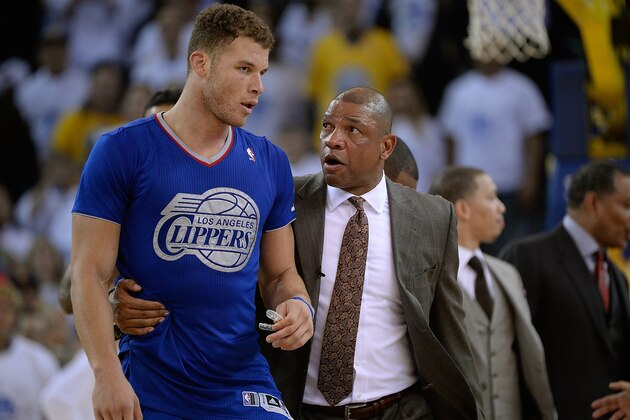 OAKLAND, CA - DECEMBER 25:  Head Coach Doc Rivers of the Los Angeles Clippers comes out on the court to get Blake Griffin #32 who was ejected for his second flagrant foul against the Golden State Warriors during the fourth quarter at ORACLE Arena on December 25, 2013 in Oakland, California. NOTE TO USER: User expressly acknowledges and agrees that, by downloading and or using this photograph, User is consenting to the terms and conditions of the Getty Images License Agreement.  (Photo by Thearon W. Henderson/Getty Images)