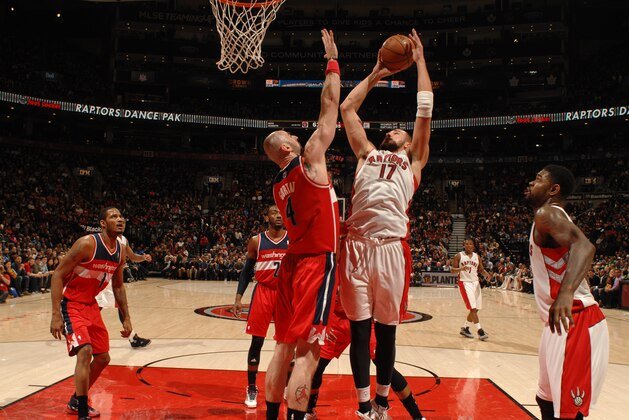 TORONTO, CANADA - February 27: Jonas Valanciunas #17 of the Toronto Raptors goes up for a shot during a game against the Washington Wizards on February 27, 2014 at the Air Canada Centre in Toronto, Ontario, Canada.  NOTE TO USER: User expressly acknowledges and agrees that, by downloading and or using this Photograph, user is consenting to the terms and conditions of the Getty Images License Agreement.  Mandatory Copyright Notice: Copyright 2014 NBAE (Photo by Ron Turenne/NBAE via Getty Images)
