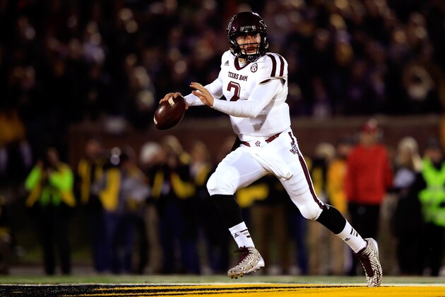 COLUMBIA, MO - NOVEMBER 30:  Quarterback Johnny Manziel #2 of the Texas A&M Aggies scrambles during the game against the Missouri Tigers on November 30, 2013 in Columbia, Missouri.  (Photo by Jamie Squire/Getty Images)