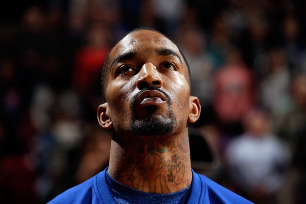 SACRAMENTO, CA - MARCH 26:  J.R. Smith #8 of the New York Knicks stands for the National Anthem before their game against the Sacramento Kings at Sleep Train Arena on March 26, 2014 in Sacramento, California. NOTE TO USER: User expressly acknowledges and agrees that, by downloading and or using this photograph, User is consenting to the terms and conditions of the Getty Images License Agreement.  (Photo by Ezra Shaw/Getty Images)