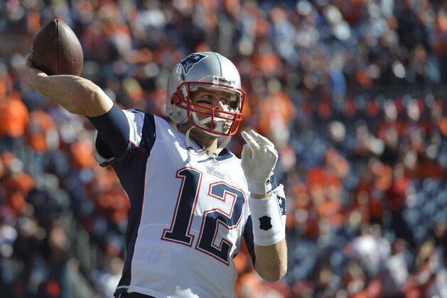 New England Patriots quarterback Tom Brady (12) warms up before the AFC Championship NFL playoff football game against Denver Broncos in Denver, Sunday, Jan. 19, 2014. (AP Photo/Jack Dempsey)