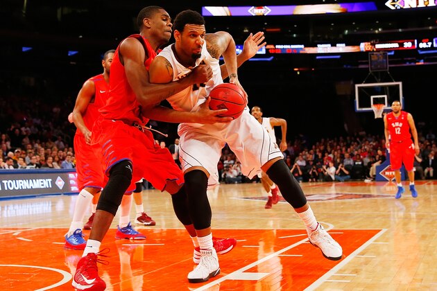 NEW YORK, NY - APRIL 03: Maurice Walker #15 of the Minnesota Golden Gophers is defended by Yanick Moreira #35 of the Southern Methodist Mustangs during 2014 NIT Championship at Madison Square Garden on April 3, 2014 in New York City.  (Photo by Mike Stobe/Getty Images)