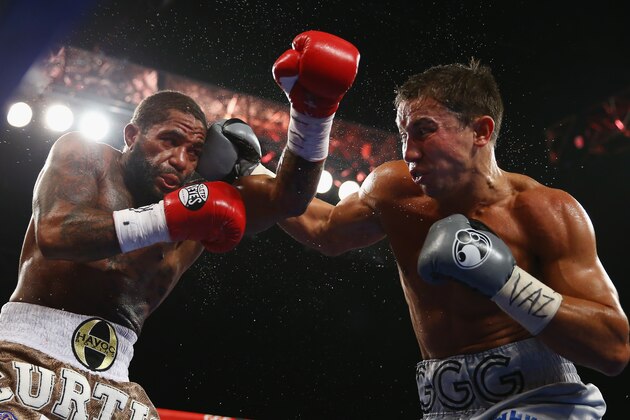 NEW YORK, NY - NOVEMBER 02: Gennady Golovkin punches Curtis Stevens during their WBA Middleweight Title fight at The Theater at Madison Square Garden on November 2, 2013 in New York City. (Photo by Al Bello/Getty Images) NEW YORK, NY - NOVEMBER 02: Gennady Golovkin punches Curtis Stevens during their WBA Middleweight Title fight at The Theater at Madison Square Garden on November 2, 2013 in New York City. (Photo by Al Bello/Getty Images)