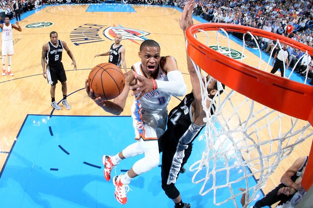 OKLAHOMA CITY, OK - APRIL 03: Russell Westbrook #0 of the Oklahoma City Thunder shoots against the San Antonio Spurs  on April 03, 2014 at the Chesapeake Energy Arena in Oklahoma City, Oklahoma. NOTE TO USER: User expressly acknowledges and agrees that, by downloading and or using this Photograph, user is consenting to the terms and conditions of the Getty Images License Agreement. Mandatory Copyright Notice: Copyright 2014 NBAE (Photo by Layne Murdoch Jr./NBAE via Getty Images)