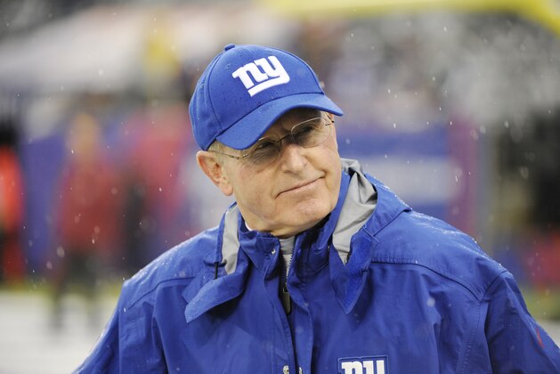 New York Giants head coach Tom Coughlin walks on the field before an NFL football game against the Washington Redskins Sunday, Dec. 29, 2013, in East Rutherford, N.J.  (AP Photo/Bill Kostroun)