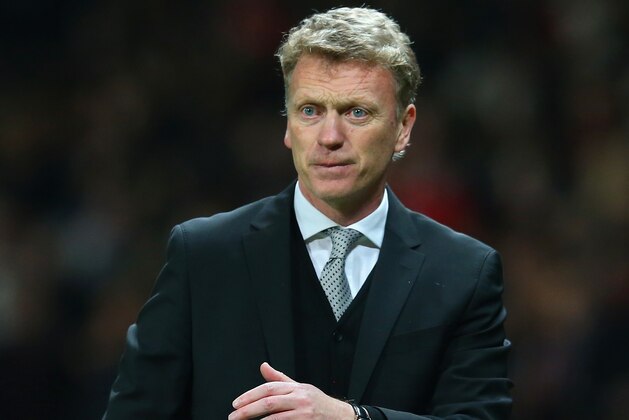 MANCHESTER, ENGLAND - APRIL 01: David Moyes manager of Manchester United looks on during the UEFA Champions League Quarter Final first leg match between Manchester United and FC Bayern Muenchen at Old Trafford on April 1, 2014 in Manchester, England.  (Photo by Alex Livesey/Getty Images)