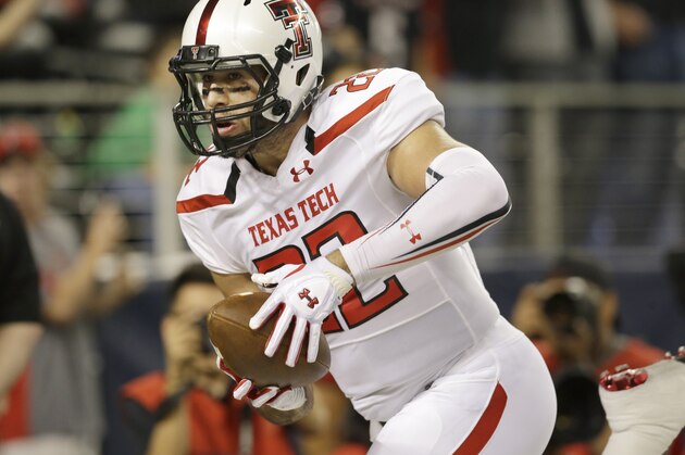 Texas Tech tight end Jace Amaro (22) catches a touchdown pass during the first half of an NCAA college football game against Baylor in Arlington, Texas,  Saturday, Nov. 16, 2013. (AP Photo/LM Otero)