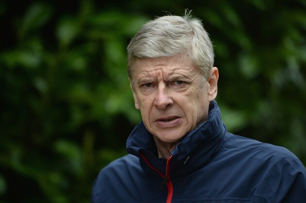 ST ALBANS, ENGLAND - MARCH 10:  Arsenal manager Arsene Wenger looks on during the Arsenal training session at London Colney on March 10, 2014 in St Albans, England.  (Photo by Michael Regan/Getty Images)
