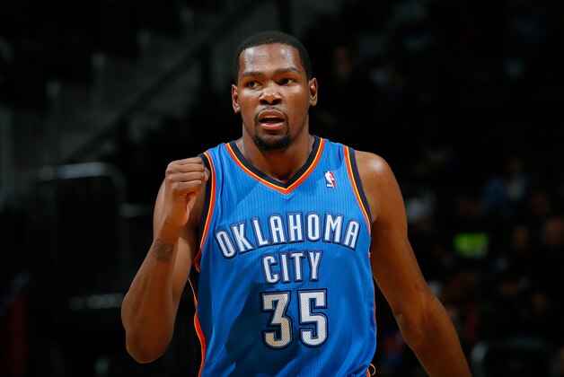 ATLANTA, GA - DECEMBER 10:  Kevin Durant #35 of the Oklahoma City Thunder reacts after a basket against the Atlanta Hawks at Philips Arena on December 10, 2013 in Atlanta, Georgia.   NOTE TO USER: User expressly acknowledges and agrees that, by downloading and or using this photograph, User is consenting to the terms and conditions of the Getty Images License Agreement.  (Photo by Kevin C. Cox/Getty Images)