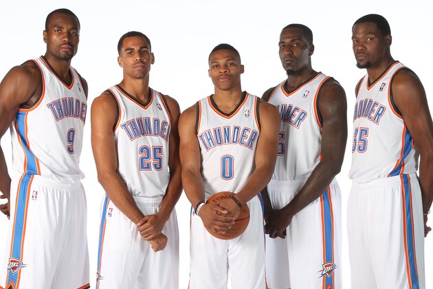 EDMOND, OK - SEPTEMBER 27: (LtoR) Serge Ibaka #9, Thabo Sefolosha #25, Russell Westbrook #0, Kenrick Perkins #5, and Kevin Durant #35 poses for a portrait during 2013 NBA Media Day on September 27, 2013 at the Thunder Events Center in Edmond, Oklahoma. NOTE TO USER: User expressly acknowledges and agrees that, by downloading and or using this Photograph, user is consenting to the terms and conditions of the Getty Images License Agreement. Mandatory Copyright Notice: Copyright 2013 NBAE (Photo by Layne Murdoch/NBAE via Getty Images)