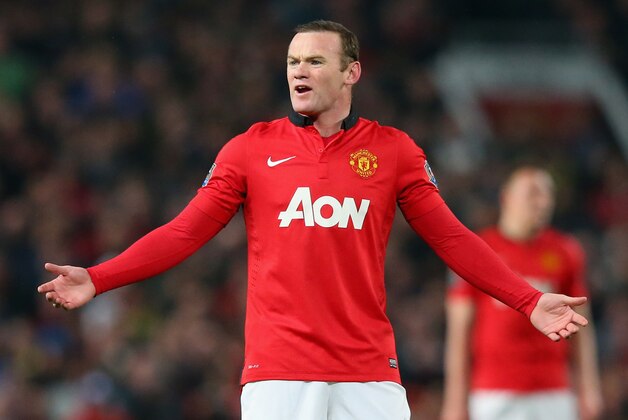 MANCHESTER, ENGLAND - MARCH 25:  Wayne Rooney of Manchester United reacts during the Barclays Premier League match between Manchester United and Manchester City at Old Trafford on March 25, 2014 in Manchester, England.  (Photo by Alex Livesey/Getty Images)
