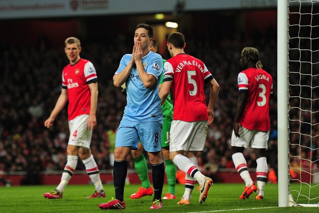 LONDON, ENGLAND - MARCH 29:  Samir Nasri of Manchester City reacts during the Barclays Premier League match between Arsenal and Manchester City at Emirates Stadium on March 29, 2014 in London, England.  (Photo by Shaun Botterill/Getty Images)