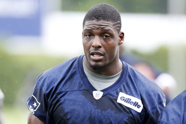 New England Patriots safety Adrian Wilson walks off the field after team football practice in Foxborough, Mass., Wednesday, May 29, 2013. (AP Photo/Michael Dwyer)