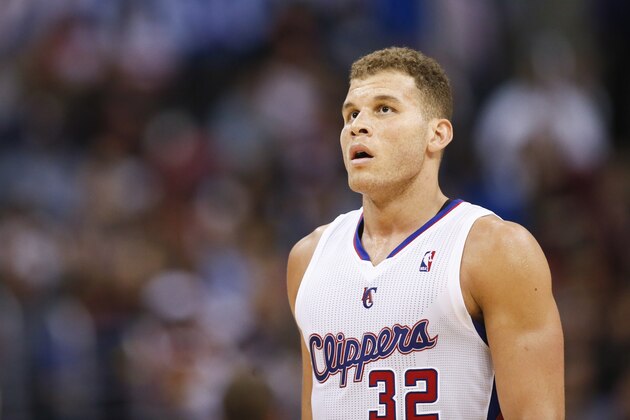 Los Angeles Clippers' Blake Griffin walks to the bench for a stop in play against the Golden State Warriors during the first half of an NBA basketball game in Los Angeles, Wednesday, March 12, 2014. (AP Photo/Danny Moloshok)