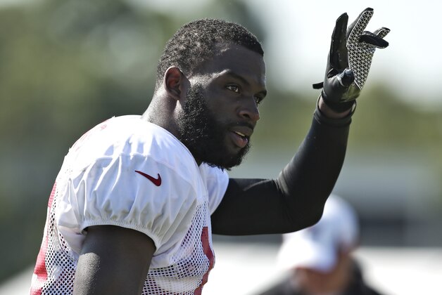 Tampa Bay Buccaneers wide receiver Mike Williams waves during an NFL football training camp Monday, July 29, 2013, in Tampa, Fla. (AP Photo/Chris O'Meara)