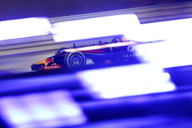 SAKHIR, BAHRAIN - APRIL 04:  Sebastian Vettel of Germany and Infiniti Red Bull Racing drives during practice for the Bahrain Formula One Grand Prix at the Bahrain International Circuit on April 4, 2014 in Sakhir, Bahrain.  (Photo by Andrew Hone/Getty Images)