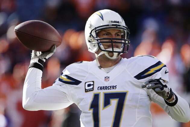 San Diego Chargers quarterback Philip Rivers warms up before playing against the Denver Broncos in an NFL AFC division playoff football game, Sunday, Jan. 12, 2014, in Denver. (AP Photo/Charlie Riedel)