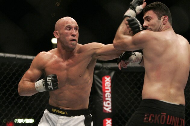 Karo Parisyan, right, covers up against Josh Burkman at UFC 71, Saturday, May 26, 2007 at The MGM Grand Arena in Las Vegas. Parisyan won via unanimous decision. (AP Photo/Eric Jamsion)