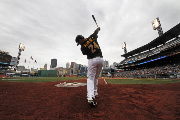 Pittsburgh Pirates' Pedro Alvarez (24) warms up on deck during the first inning of a baseball game against the Chicago Cubs in Pittsburgh Thursday, April 3, 2014. The Cubs won 3-2. AP Photo/Gene J. Puskar)