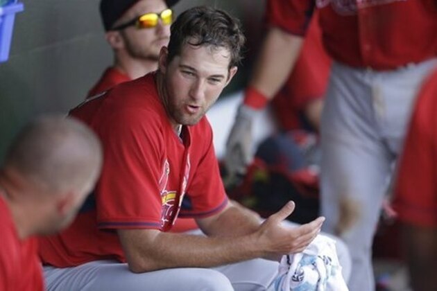 St. Louis Cardinals starting pitcher Michael Wacha is seen in the dugout during the seventh inning of a spring exhibition baseball game against the Houston Astros in Kissimmee, Fla., Saturday, March 22, 2014. (AP Photo/Carlos Osorio)