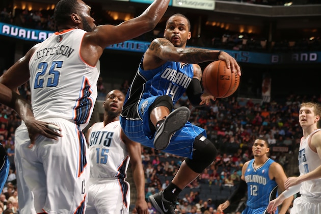 CHARLOTTE, NC - APRIL 4:  Jameer Nelson #14 of the Orlando Magic makes a pass against the Charlotte Bobcats during the game at the Time Warner Cable Arena on April 4, 2014 in Charlotte, North Carolina. NOTE TO USER: User expressly acknowledges and agrees that, by downloading and or using this photograph, User is consenting to the terms and conditions of the Getty Images License Agreement.  Mandatory Copyright Notice:  Copyright 2014 NBAE (Photo by Brock Williams-Smith/NBAE via Getty Images)