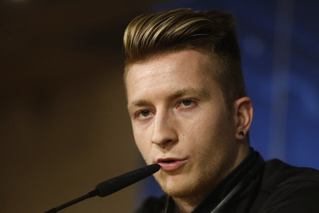 Dortmund's Marco Reus speaks during a press conference at the Santiago Bernabeu stadium in Madrid, Spain, Tuesday, April 1, 2014. Borussia Dortmund will face Real Madrid in a first leg quarterfinal Champions League soccer match April 2. (AP Photo/Andres Kudacki)