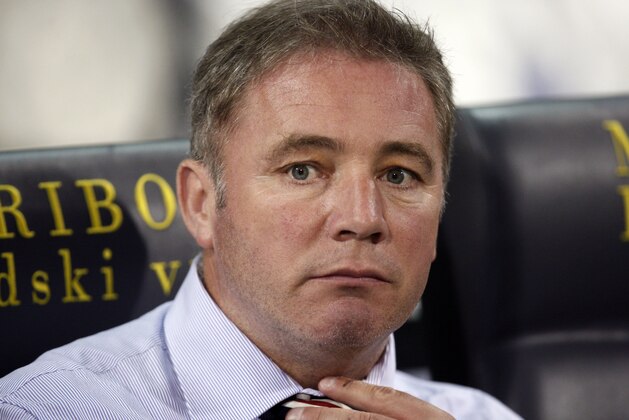 Rangers' coach Ally McCoist  reacts during the UEFA Europa league play-off 1st leg soccer match between Glasgow Rangers and NK  Maribor in Maribor, Slovenia, Thursday, Aug. 18, 2011. (AP Photo/Filip Horvat)