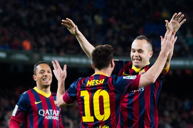 BARCELONA, SPAIN - MARCH 26: Adriano Correia (L), Lionel Messi (C) and Andres Iniesta (R) of FC Barcelona celebrate after Lionel Messi scored his team's second goal during the La Liga match between FC Barcelona and RC Celta de Vigo at Camp Nou on March 26, 2014 in Barcelona, Spain. (Photo by Alex Caparros/Getty Images) BARCELONA, SPAIN - MARCH 26: Adriano Correia (L), Lionel Messi (C) and Andres Iniesta (R) of FC Barcelona celebrate after Lionel Messi scored his team's second goal during the La Liga match between FC Barcelona and RC Celta de Vigo at Camp Nou on March 26, 2014 in Barcelona, Spain. (Photo by Alex Caparros/Getty Images)