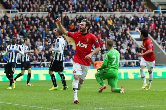 NEWCASTLE UPON TYNE, ENGLAND - APRIL 05:  Juan Mata of Manchester United celebrates scoring their second goal during the Barclays Premier League match between Newcastle United and Manchester United  at St James' Park on April 5, 2014 in Newcastle upon Tyne, England.  (Photo by Jan Kruger/Getty Images)