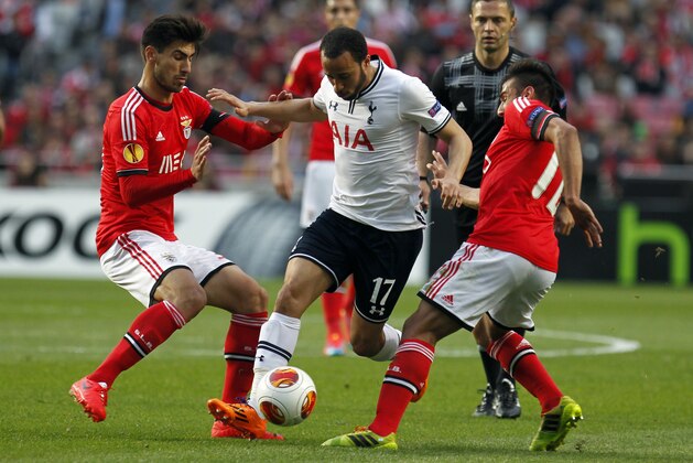 Tottenham's Andros Townsend, centre, challenges Benfica's Andre Gomes, left, and Eduardo Salvio, from Argentina, during the Europa League, round of 16, second leg soccer match between Benfica and Tottenham at Benfica's Luz stadium, in Lisbon, Thursday, March 20, 2014. (AP Photo/Francisco Seco) Tottenham's Andros Townsend, centre, challenges Benfica's Andre Gomes, left, and Eduardo Salvio, from Argentina, during the Europa League, round of 16, second leg soccer match between Benfica and Tottenham at Benfica's Luz stadium, in Lisbon, Thursday, March 20, 2014. (AP Photo/Francisco Seco)