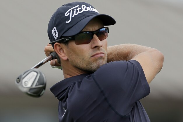 Adam Scott, of Australia, tees off on the first hole during the final round of the Arnold Palmer Invitational golf tournament at Bay Hill Sunday, March 23, 2014, in Orlando, Fla. (AP Photo/Chris O'Meara)