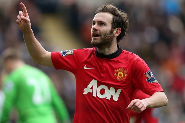Manchester United's Juan Mata celebrates his goal during their English Premier League soccer match against Newcastle United at St James' Park, Newcastle, England, Saturday, April 5, 2014. (AP Photo/Scott Heppell)