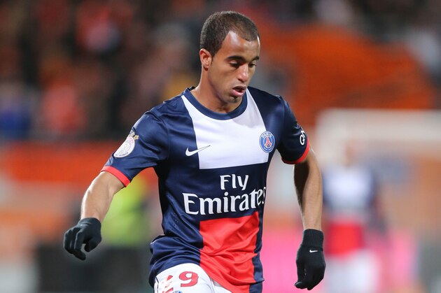 Paris Saint Germain's forward Lucas Moura of Brazil runs with the ball during his French League one soccer match, in Lorient, Friday, March 21, 2014. Paris won 1-0.(AP Photo/David Vincent)