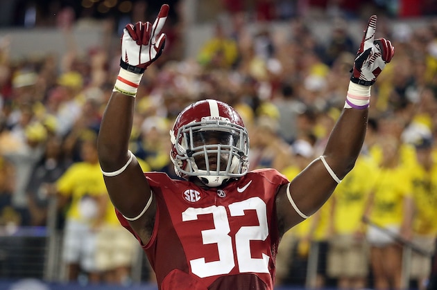 ARLINGTON, TX - SEPTEMBER 01:  C.J. Mosley #32 of the Alabama Crimson Tide celebrates a touchdown interception against the Michigan Wolverines at Cowboys Stadium on September 1, 2012 in Arlington, Texas.  (Photo by Ronald Martinez/Getty Images)