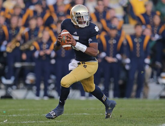SOUTH BEND, IN - NOVEMBER 17:  Everett Golson #5 of the Notre Dame Fighting Irish rolls out against the Wake Forest Demon Deacons at Notre Dame Stadium on November 17, 2012 in South Bend, Indiana. Notre Dame defeated Wake Forest 38-0.  (Photo by Jonathan Daniel/Getty Images)