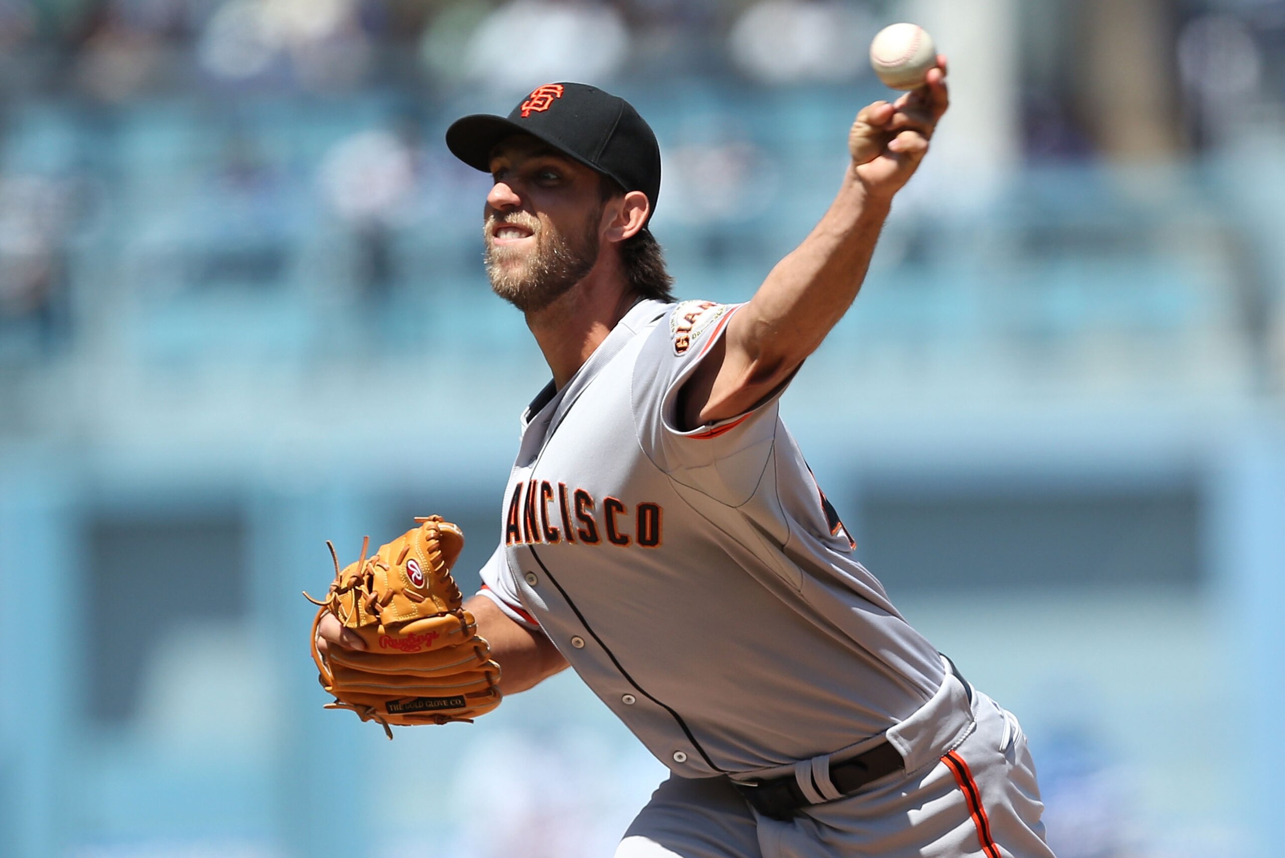 LOS ANGELES, CA - APRIL 05:  Pitcher Madison Bumgarner #40 of the San Francisco Giants pitches in the first inning against the Los Angeles Dodgers during the MLB game at Dodger Stadium on April 5, 2014 in Los Angeles, California.  (Photo by Victor Decolongon/Getty Images)