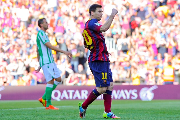 BARCELONA, SPAIN - APRIL 05:  Lionel Messi of FC Barcelona celebrates after scoring the opening goal during the La Liga match between FC Barcelona and Real Betis Balompie at Camp Nou on April 5, 2014 in Barcelona, Spain.  (Photo by David Ramos/Getty Images)