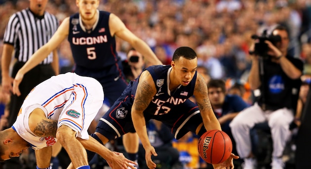 ARLINGTON, TX - APRIL 05: Shabazz Napier #13 of the Connecticut Huskies picks up the ball from Scottie Wilbekin #5 of the Florida Gators during the NCAA Men's Final Four Semifinal at AT&T Stadium on April 5, 2014 in Arlington, Texas. (Photo by Ronald Martinez/Getty Images) ARLINGTON, TX - APRIL 05: Shabazz Napier #13 of the Connecticut Huskies picks up the ball from Scottie Wilbekin #5 of the Florida Gators during the NCAA Men's Final Four Semifinal at AT&T Stadium on April 5, 2014 in Arlington, Texas. (Photo by Ronald Martinez/Getty Images)