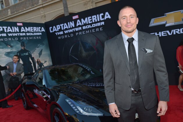 Georges St-Pierre arrives at the World Premiere of "Captain America: The Winter Soldier" at the El Capitan Theatre, on Thursday, March 13, 2014, in Los Angeles. (Photo by John Shearer/Invision/AP)