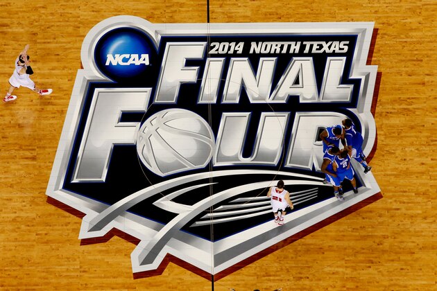 ARLINGTON, TX - APRIL 05:  Aaron Harrison #2 of the Kentucky Wildcats celebrates after hitting a shot against the Wisconsin Badgers during the NCAA Men's Final Four Semifinal at AT&T Stadium on April 5, 2014 in Arlington, Texas.  (Photo by Tom Pennington/Getty Images)