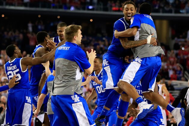 ARLINGTON, TX - APRIL 05:  James Young #1 of the Kentucky Wildcats reacts after defeating the Wisconsin Badgers 74-73 in the NCAA Men's Final Four Semifinal at AT&T Stadium on April 5, 2014 in Arlington, Texas.  (Photo by Jamie Squire/Getty Images)